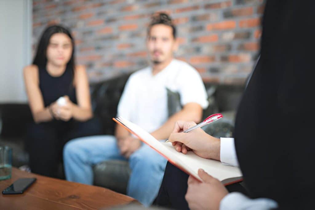couple consulting profession for therapy for compulsive behaviour