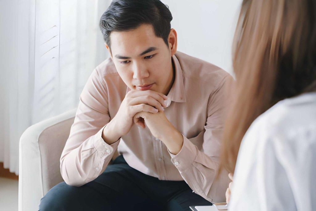 a person getting counselling to work through the fear of disappointing someone